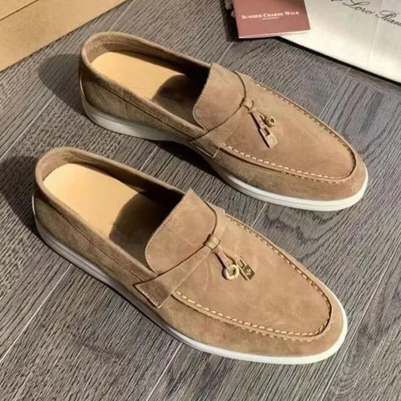 Slip-on loafers with rubber soles, steel toe caps, and artificial PU uppers in multiple colour options