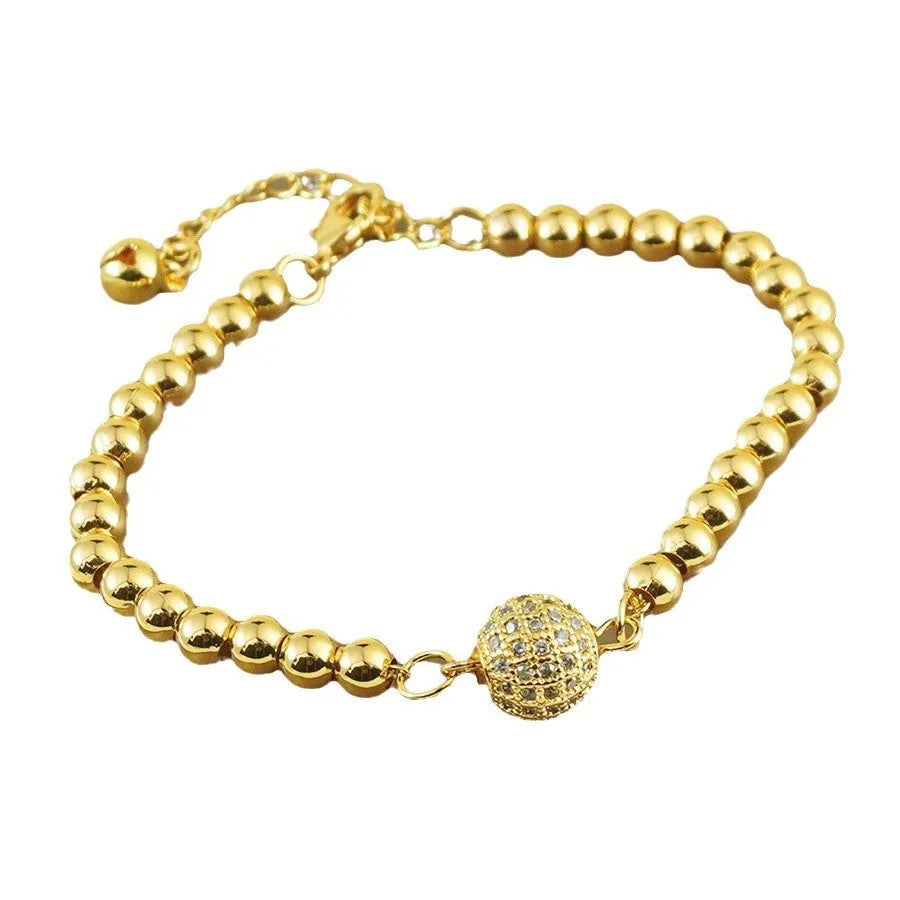 Women's copper bracelet with heart-shaped Arabic design and zircon stone detailing