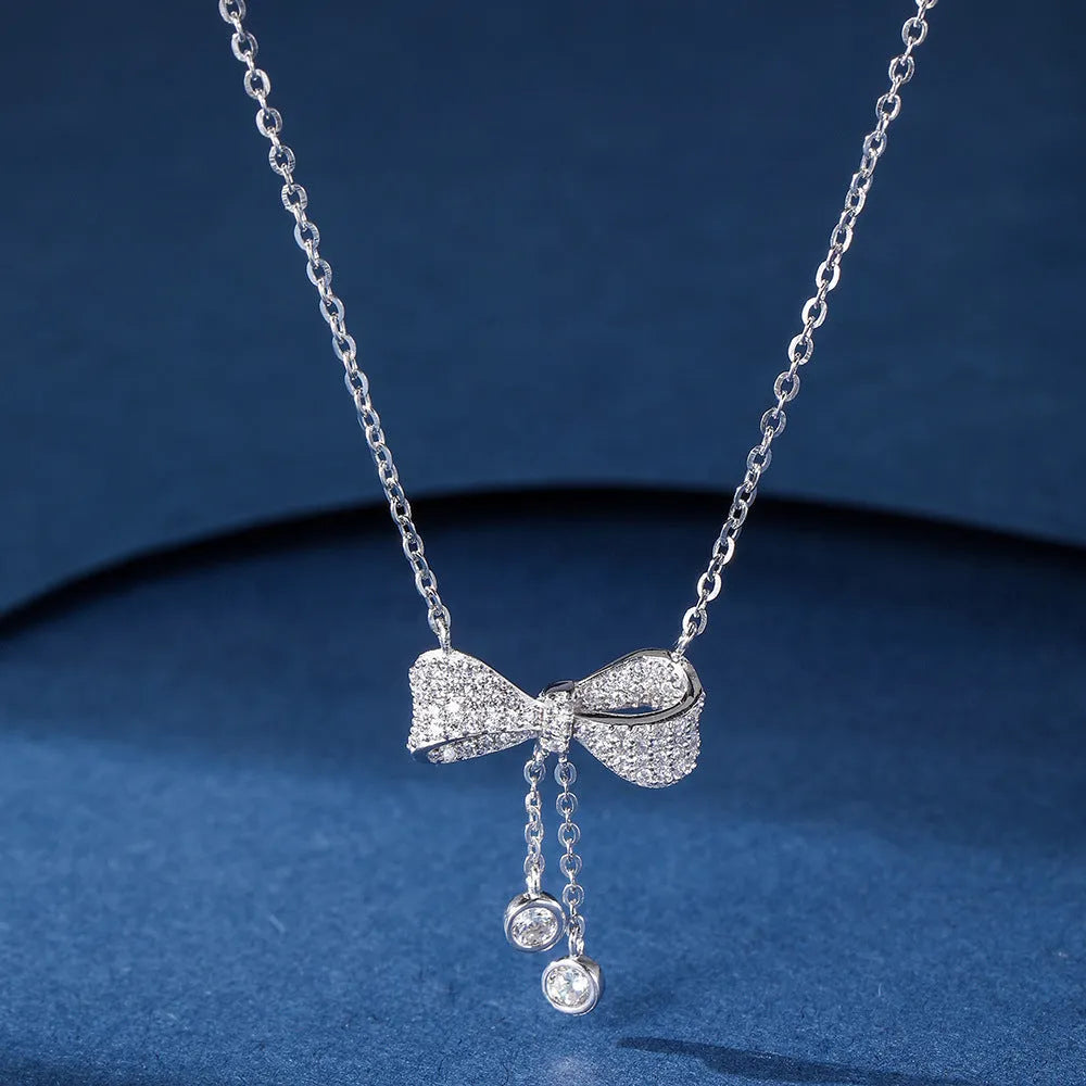 925 sterling silver necklace with bow pendant on a 40-45cm O-ring chain