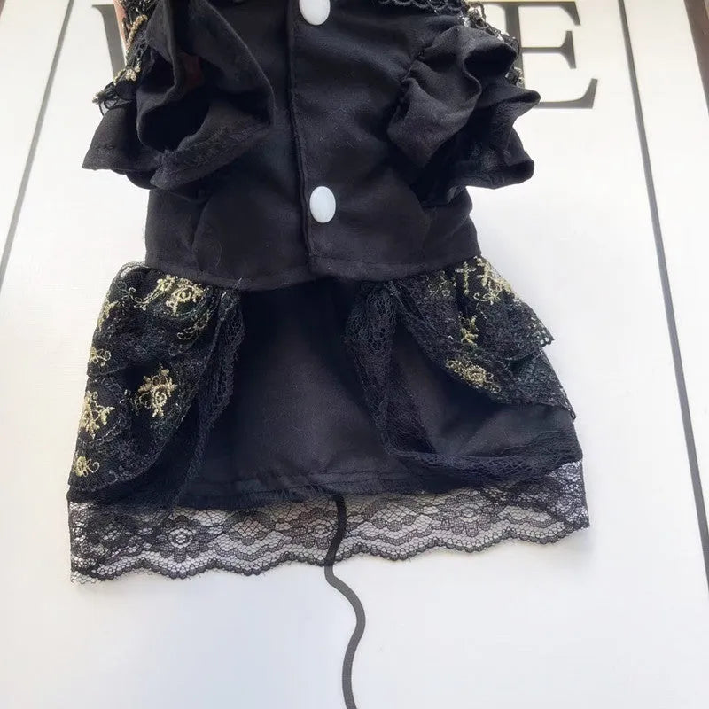 Golden gothic princess-style tiered skirt dress for a small dog or cat on a mannequin.