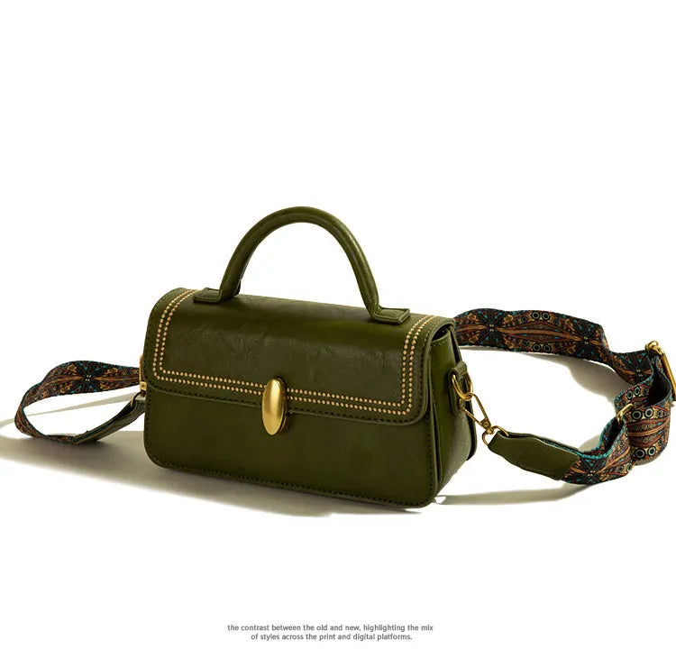 Brown retro messenger bag with vertical square shape showing internal phone and document compartments