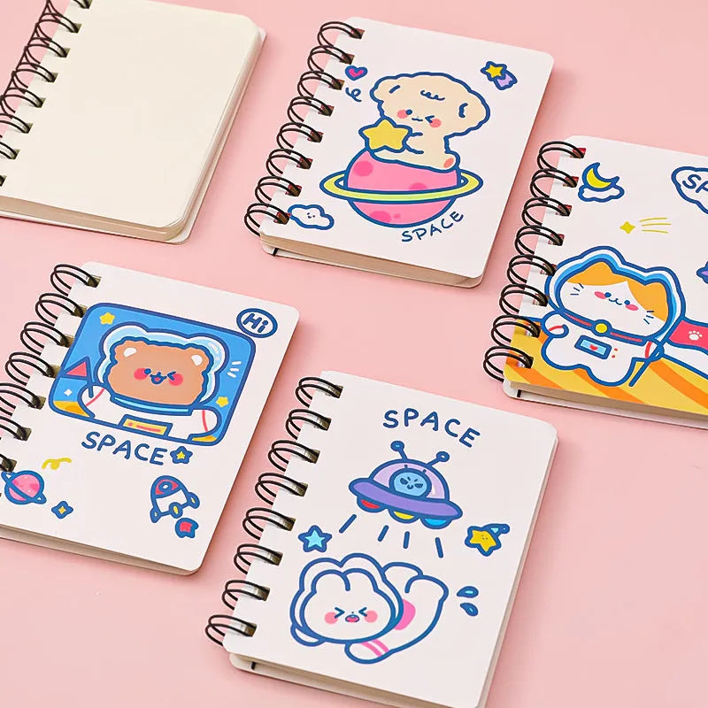 Astronaut portable pocket flipper notebook showing 10.5cm by 8cm dimensions with spiral binding