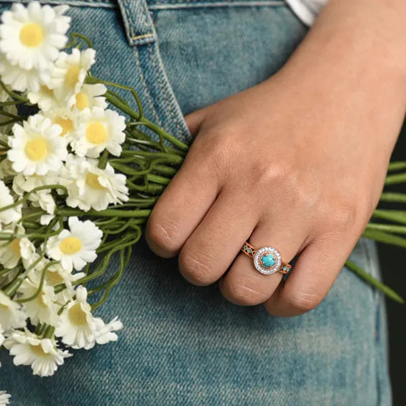 Women's turquoise ethnic style ring with zircon inlay and rose gold finish on copper, geometric shape.