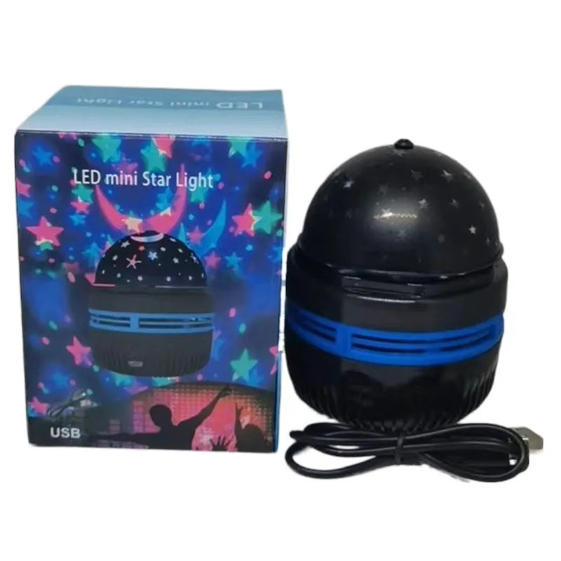 Mini crystal magic ball atmosphere projector showing starry sky and aurora light projection on a dark background.