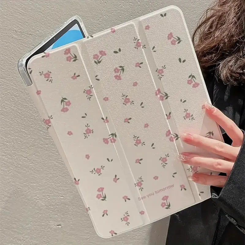 Transparent floral tri-fold iPad protective case showing magnetic stand function.