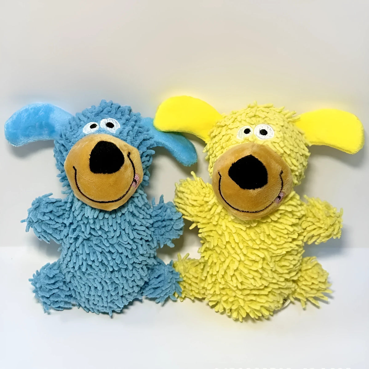 Blue plush dog-shaped squeaky toy for puppies and dogs, soft fabric with cheerful face