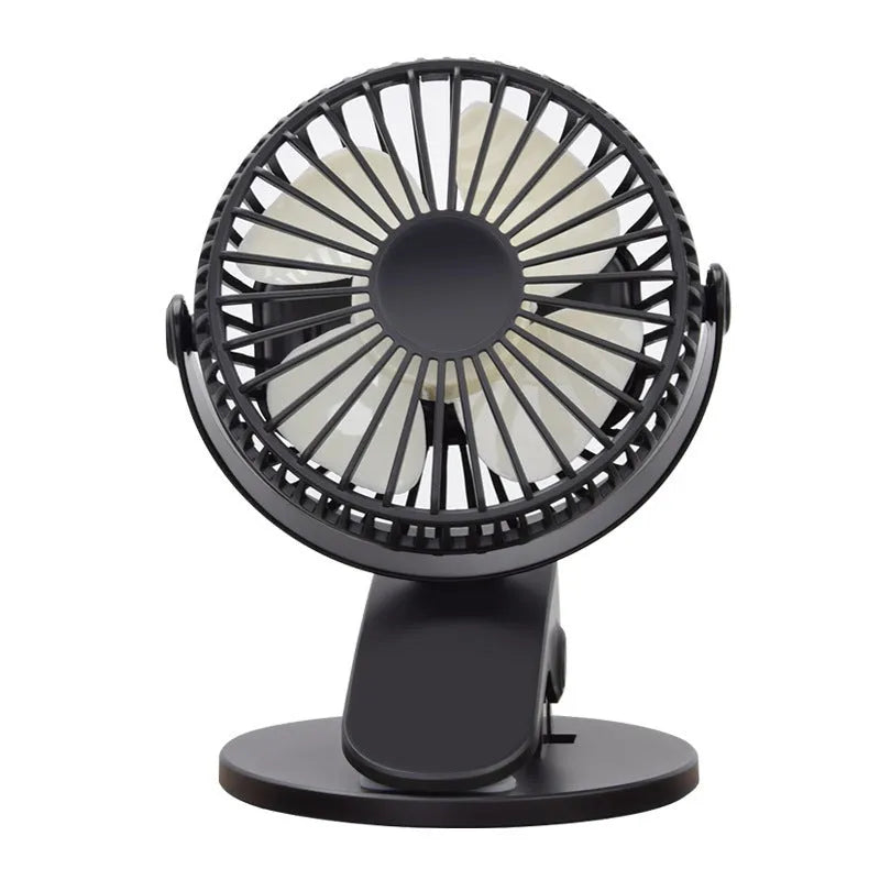 Small white USB rechargeable clip fan with plastic blades attached to a stroller handle.