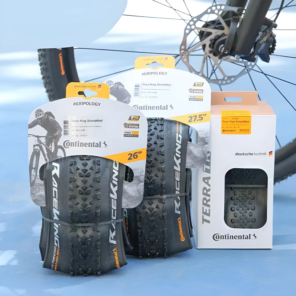 Mountain bike folding outer tyre showing tread pattern and sidewall in yellow or white options