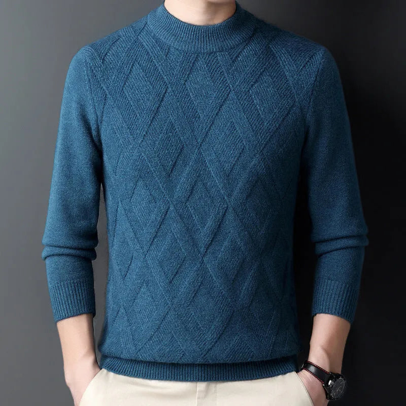 Man wearing a thick diamond jacquard pattern wool blend pullover sweater in a neutral colour.