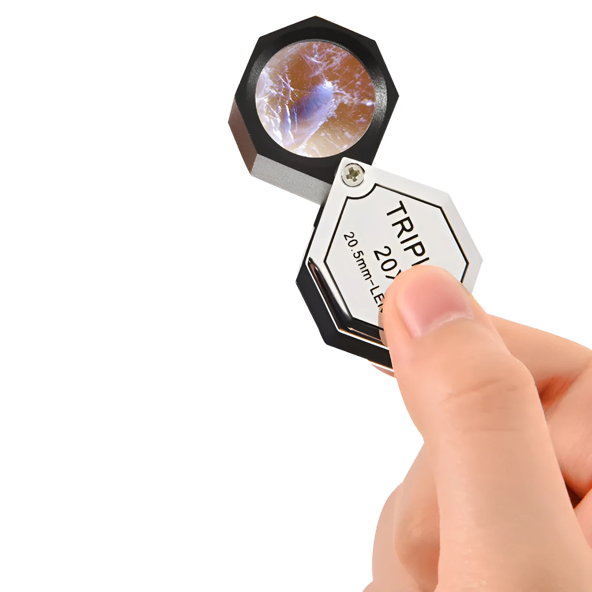 Handheld metal portable magnifying glass for jewellery and coin inspection with optical glass lenses.