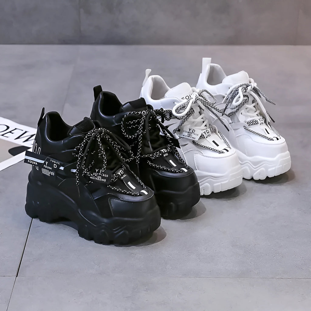 Women's white mesh platform sports shoes with a cross-strap design and rubber sole