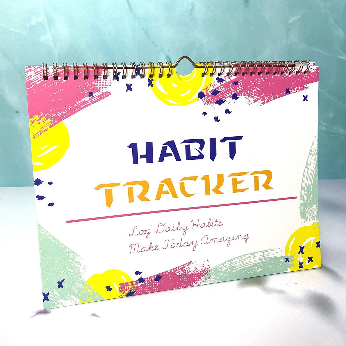 Self-discipline habit tracking notebook showing 12 internal pages with A4 21x28cm dimensions