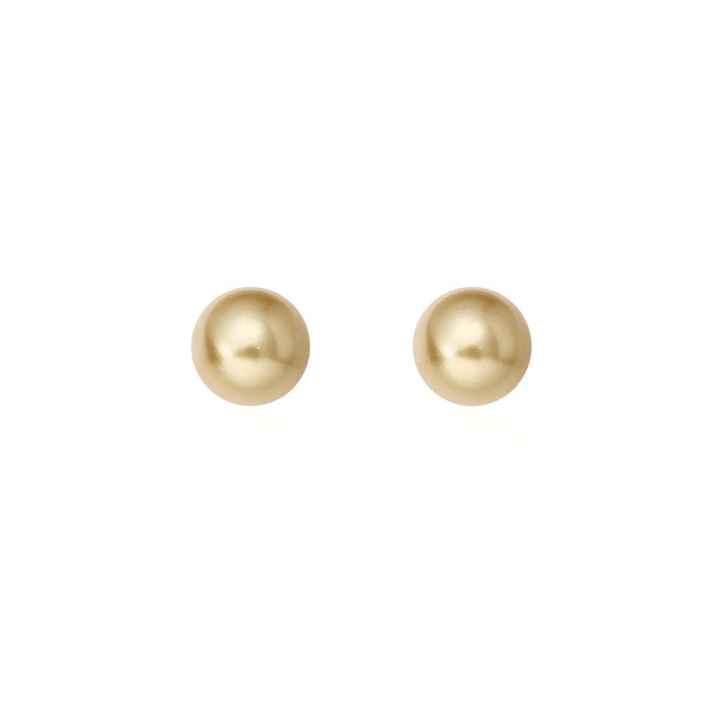 Geometric pearl stud earrings with eight-pointed star design in silver setting
