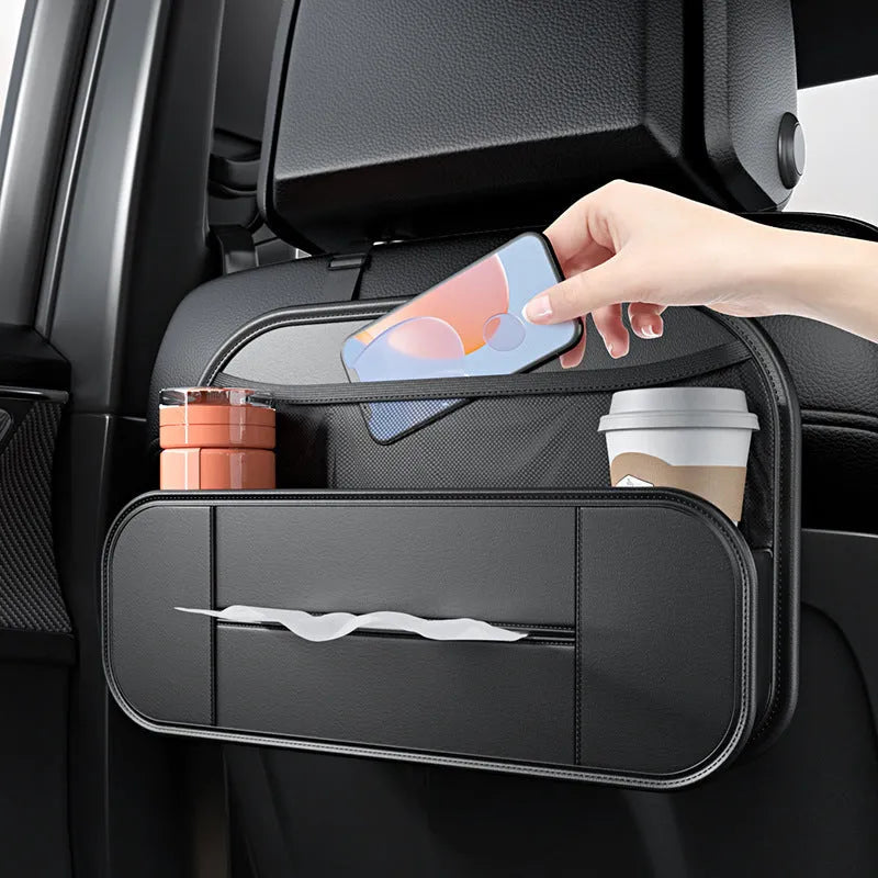 Black leather car seat rear storage bag mounted behind a vehicle seat