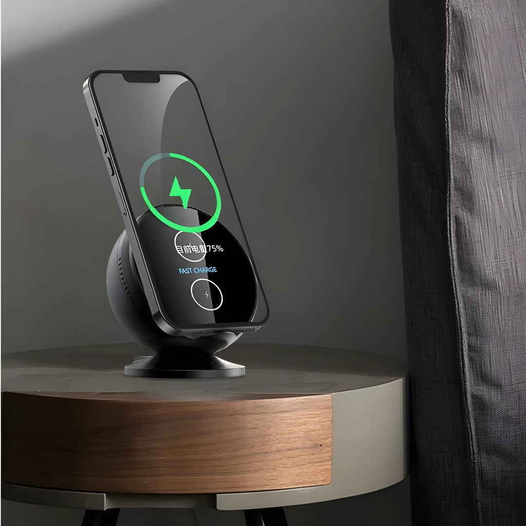 Black multifunctional wireless charging phone holder with integrated Bluetooth speaker on a desk