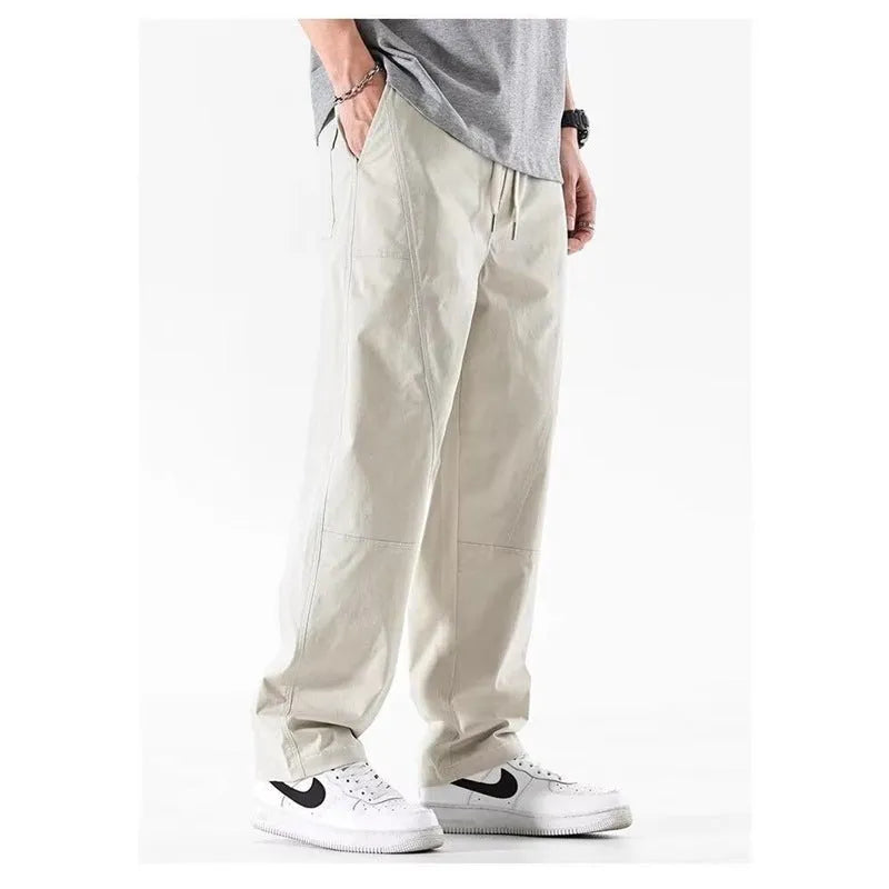 Cotton wide-leg trousers with antibacterial function in milky white and black colours showing pants-mouth design