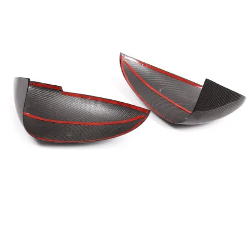 Pair of true carbon fibre rearview mirror covers for a Porsche Macan, shown in black.