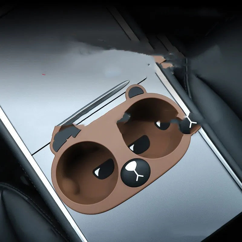 Silicone car cup holder limiter for central console compartments in grey colour with cartoon pattern