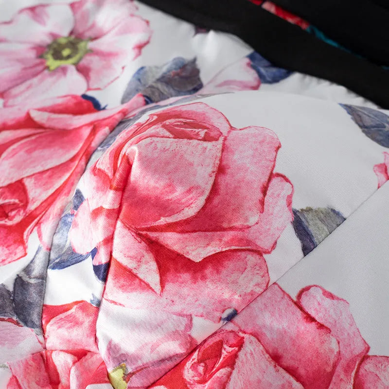Men's ice silk underwear in a mid waist style with a floral fashion print on breathable polyester fabric.