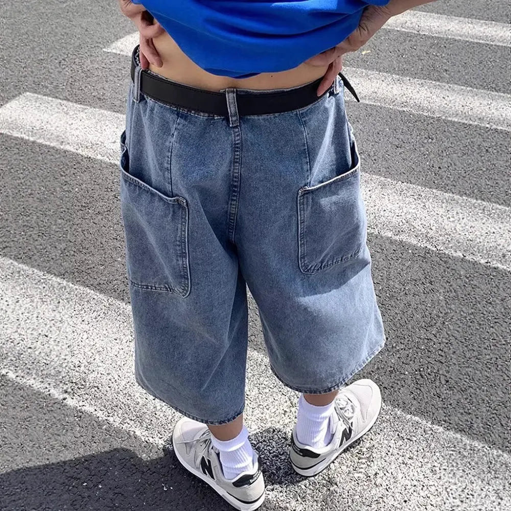 Men's blue washed denim pirate shorts with a straight leg and high waist.
