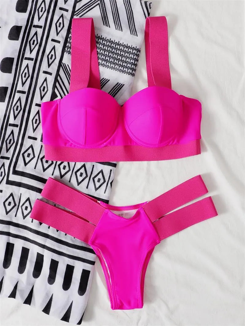 Women's colour-contrast bikini with steel bracket push-up support, shown in rose red.