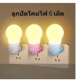Plug-in bedside baby night lamp in white, blue, or pink shell with round modern design.