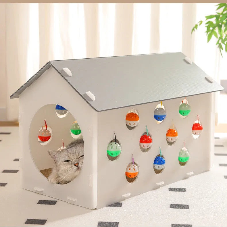 Plastic cat scratch board integrated with nest area and tunnel containing bell balls