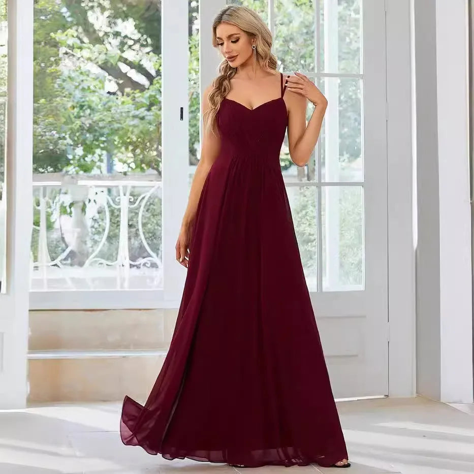 Women's long pleated A-line dress in polyester fabric, sleeveless design available in multiple colours