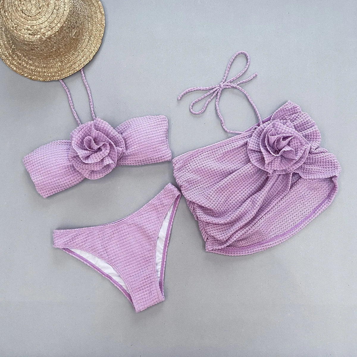 Women's 3D flower split three-piece bikini set in white or purple nylon spandex