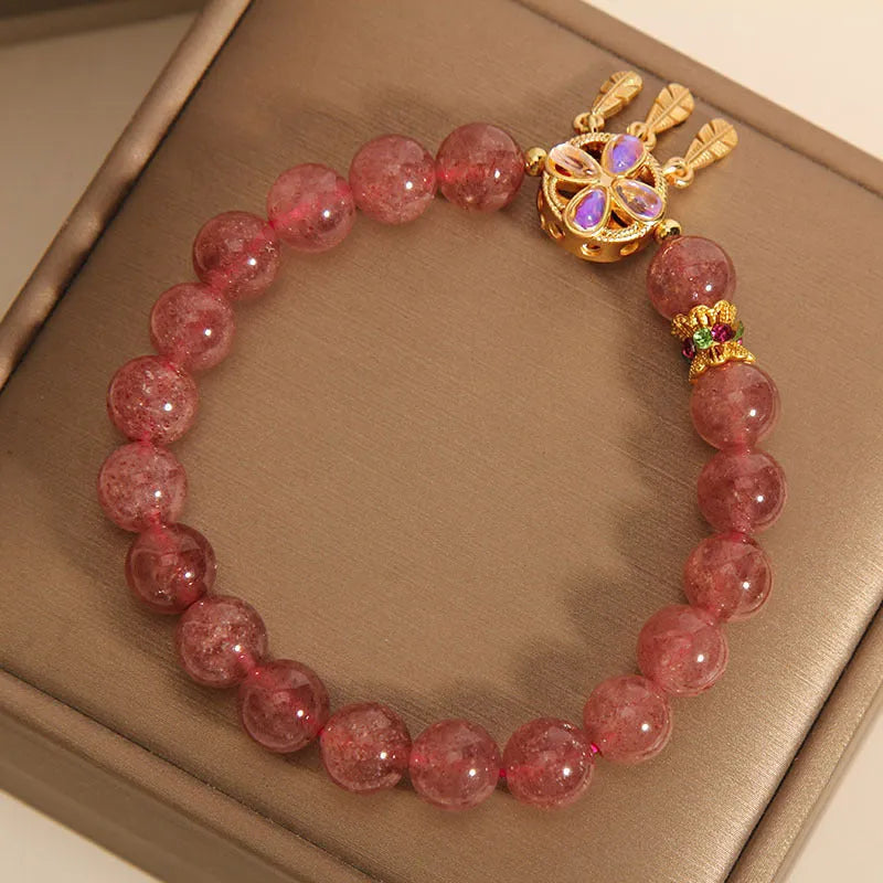 Women's strawberry quartz bracelet with four leaf clover dream catcher pendant charm
