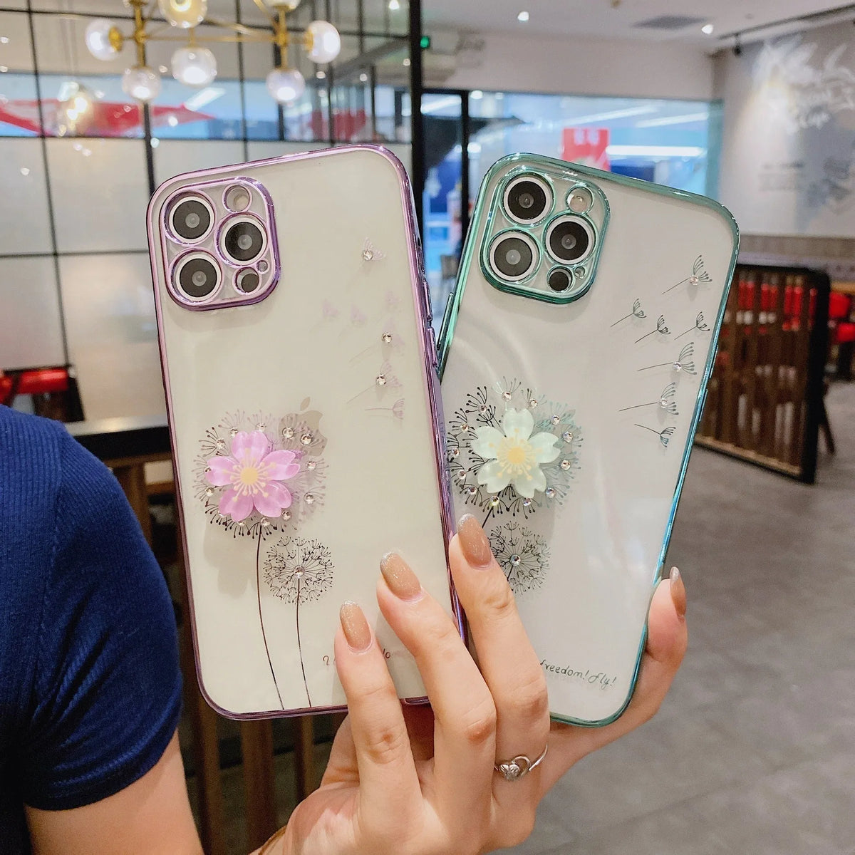 Green TPU iPhone case with a floral design and built-in screen protector shown on an iPhone.
