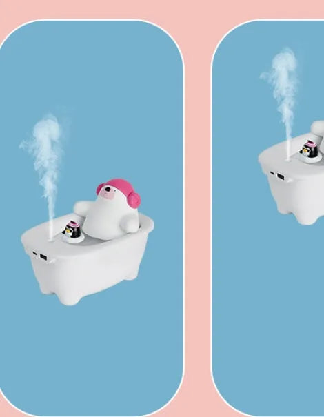 White USB air humidifier and scent diffuser with large water tank on a desk.