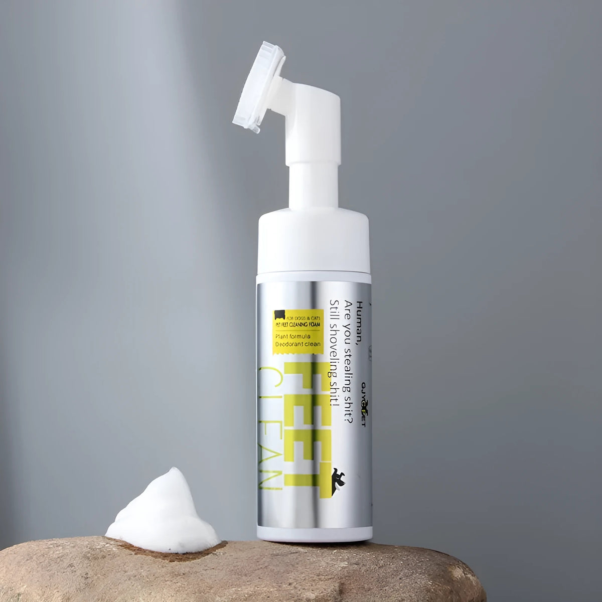 Pet cleaning kit with bottles of foot foam, deodorant spray, ear cleaner, and packets of ear and eye wipes for dogs and cats.