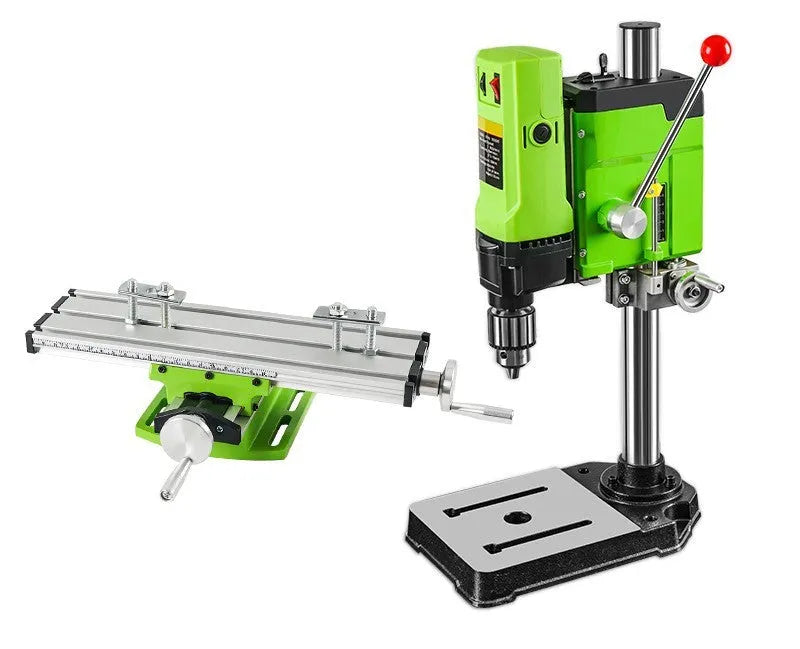 Bench drill and milling machine with cross bench pliers on workshop bench