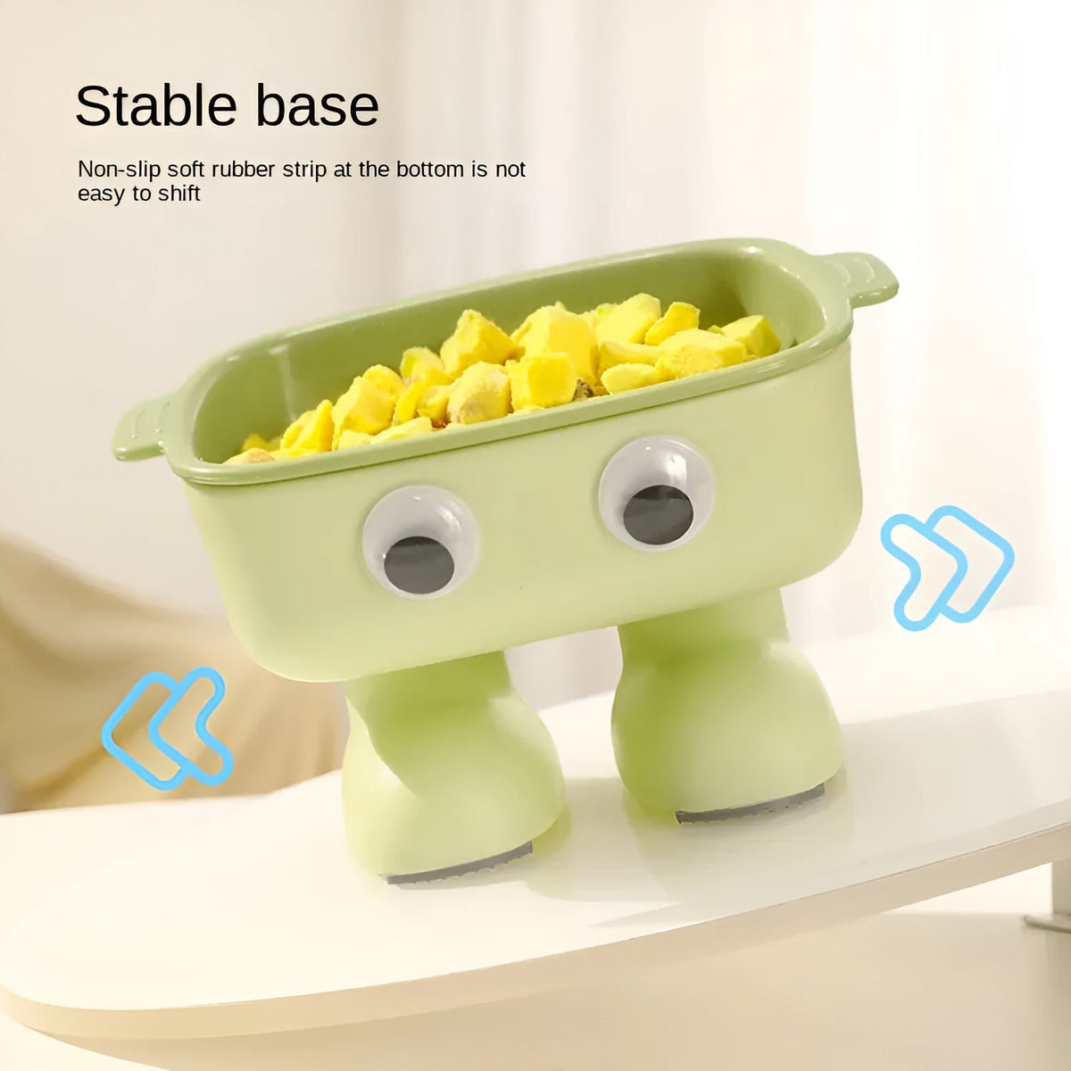 Green elevated cat bowl with 15° tilt, robot design, and anti-slip base