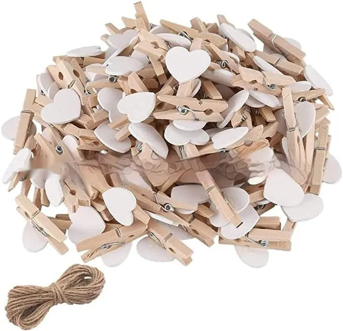 Set of five solid wood heart-shaped clips in red, pink, white, yellow, and rose colours.