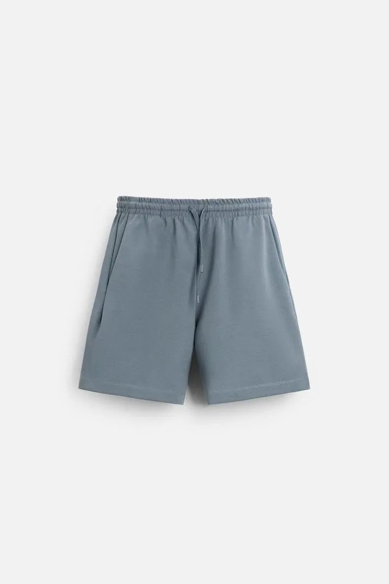 Loose fit double-sided texture polyester short sleeve top and matching shorts set in blue colour