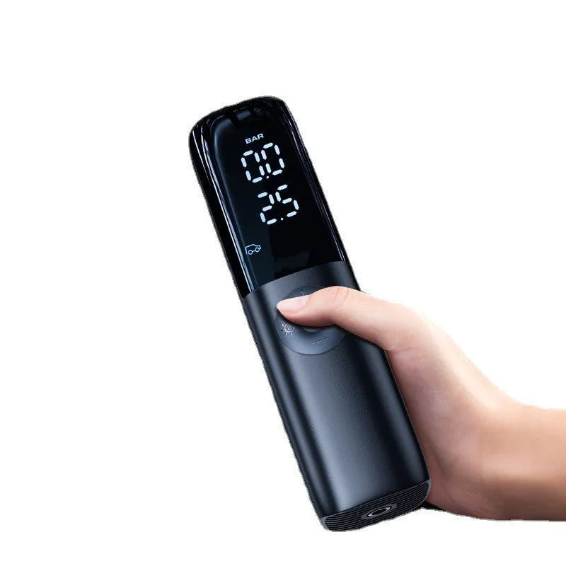 Black portable electric car air pump with tyre pressure gauge and inflation tube.