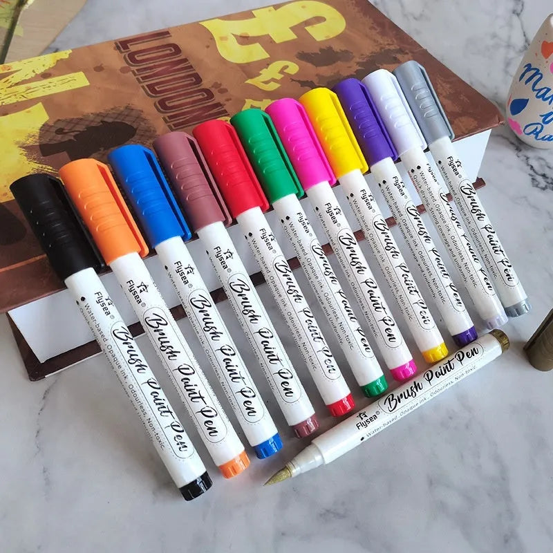 Set of gouache acrylic marker pens for hand lettering and greeting card art in various colours.
