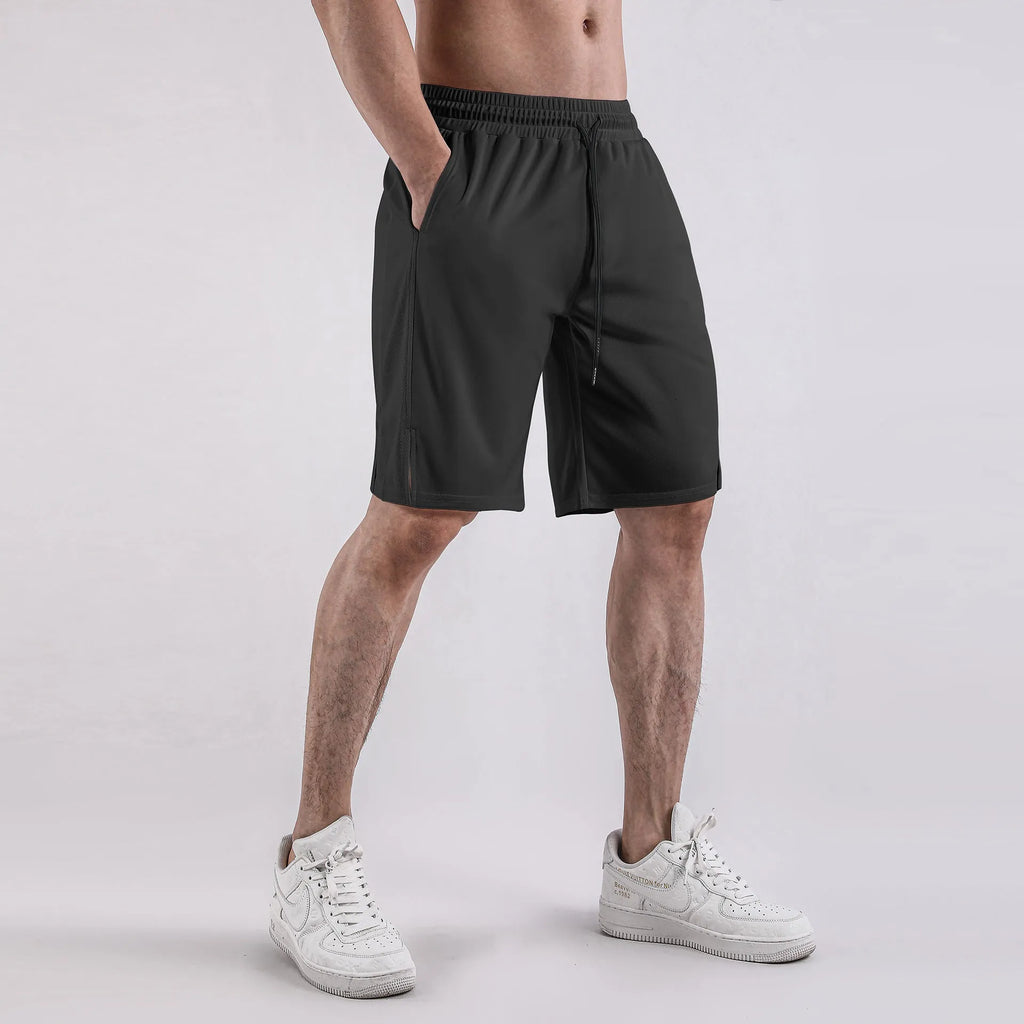 Men's black quick-drying mesh capri shorts with an elastic mid waist on a white background.