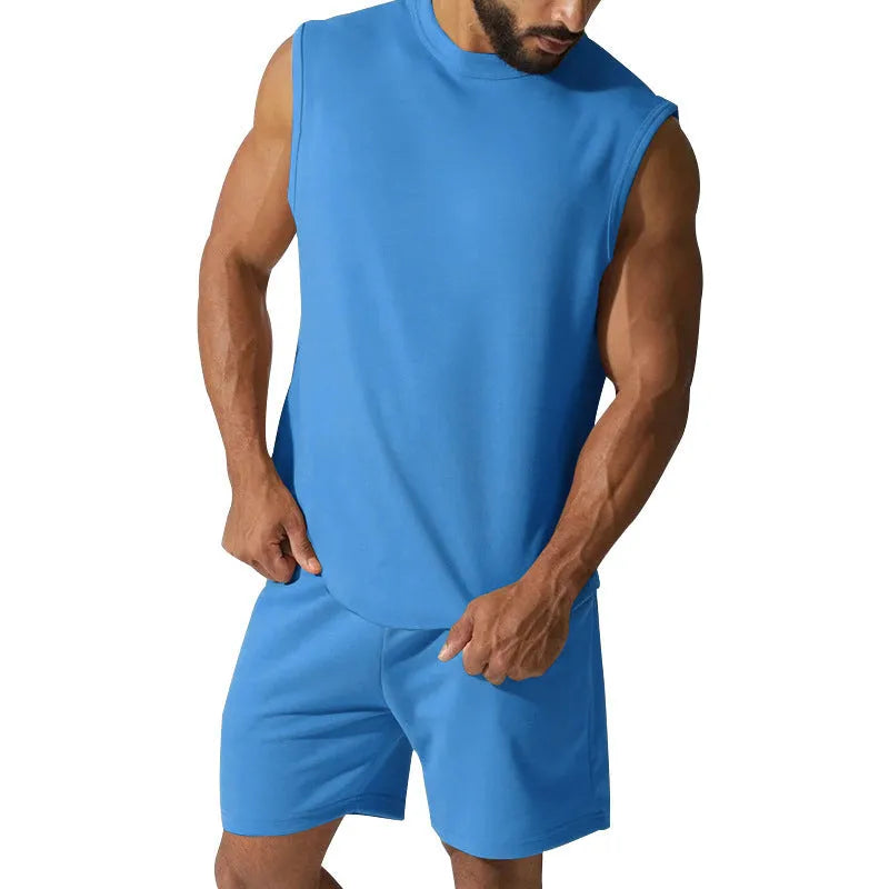Men's sleeveless cotton blend sports top and matching shorts set in a solid colour.