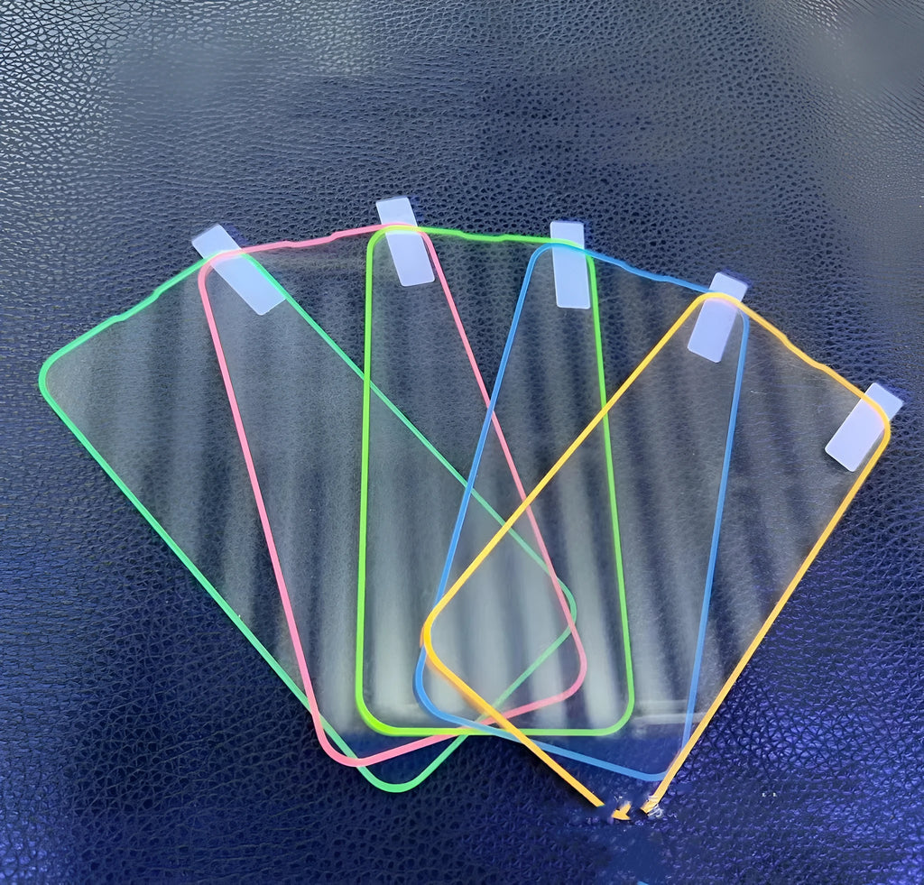 Luminous tempered glass screen protector for iPhone with glowing pink edge on a mobile phone.
