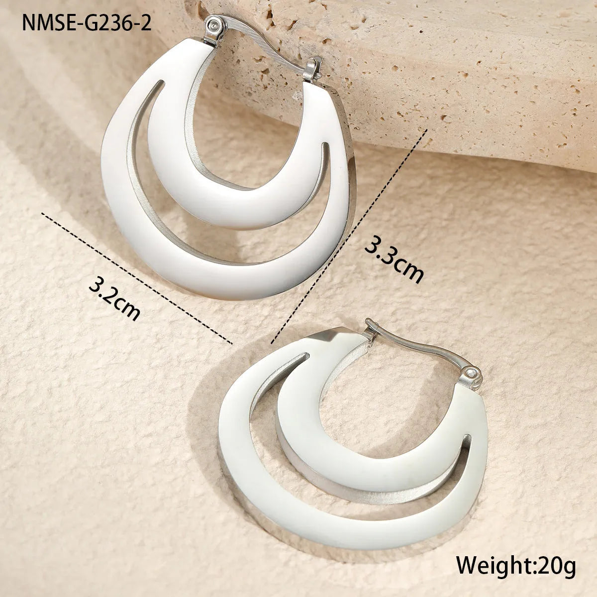 Geometric French earrings with round ring design in 18K gold-plated stainless steel, shown in gold and steel silver finishes.