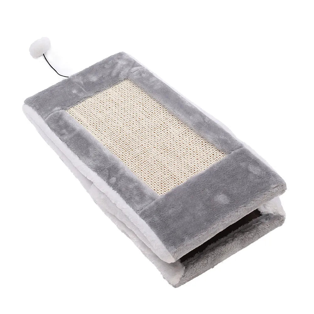 Triangle-shaped grey and white cat bed with sisal scratching sides and a soft plush sleeping area.