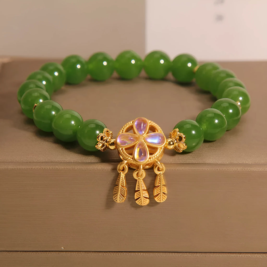 Green jasper bracelet with a four-leaf clover dream catcher crystal pendant for women.
