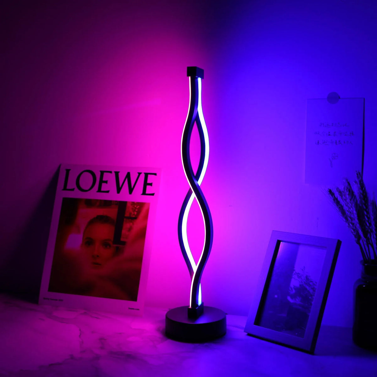 Black aluminium desk lamp with touch dimming and three-colour button controls