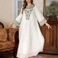 Women's white Dubai Arabic robe with long sleeves and full-length skirt in polyester fabric