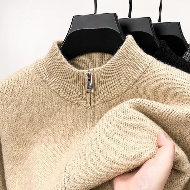 Men's black knitted zip cardigan with stand collar showing loose fit and thickened fabric texture