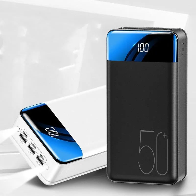 Large black or white 50000mAh power bank showing three USB output ports