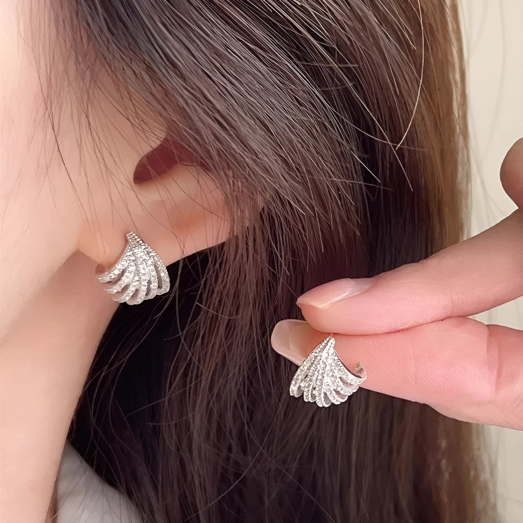Women's geometric zircon earrings with platinum electroplated finish and line design